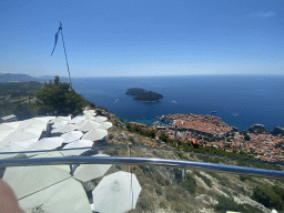 The terrace of the Restaurant Panorama at Mount Srd, the Old Town, Fort Lovrijenac and the Lokrum island, viewed from the viewing platform at the upper station of the Dubrovnik Cable Car