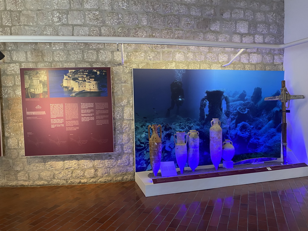 Vases, cross and information on the Maritime Museum at the lower floor of the Maritime Museum