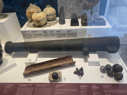 Cannon, cannonballs and other items at the lower floor of the Maritime Museum, with explanation