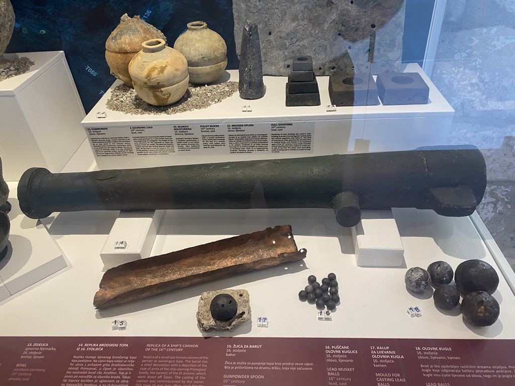 Cannon, cannonballs and other items at the lower floor of the Maritime Museum, with explanation