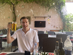 Tim with a beer at the Aquarius Tavern