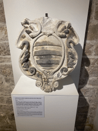 Sculpture `The State Coat of Arms of the Dubrovnik Republic` at the lower floor of the Rector`s Palace, with explanation