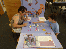 Miaomiao and Max playing Ludo at the upper floor of the Rector`s Palace