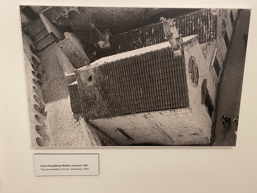 Photograph of the Annunciation Church at the `War Photographs` exposition at the lower floor of the Rector`s Palace, with explanation