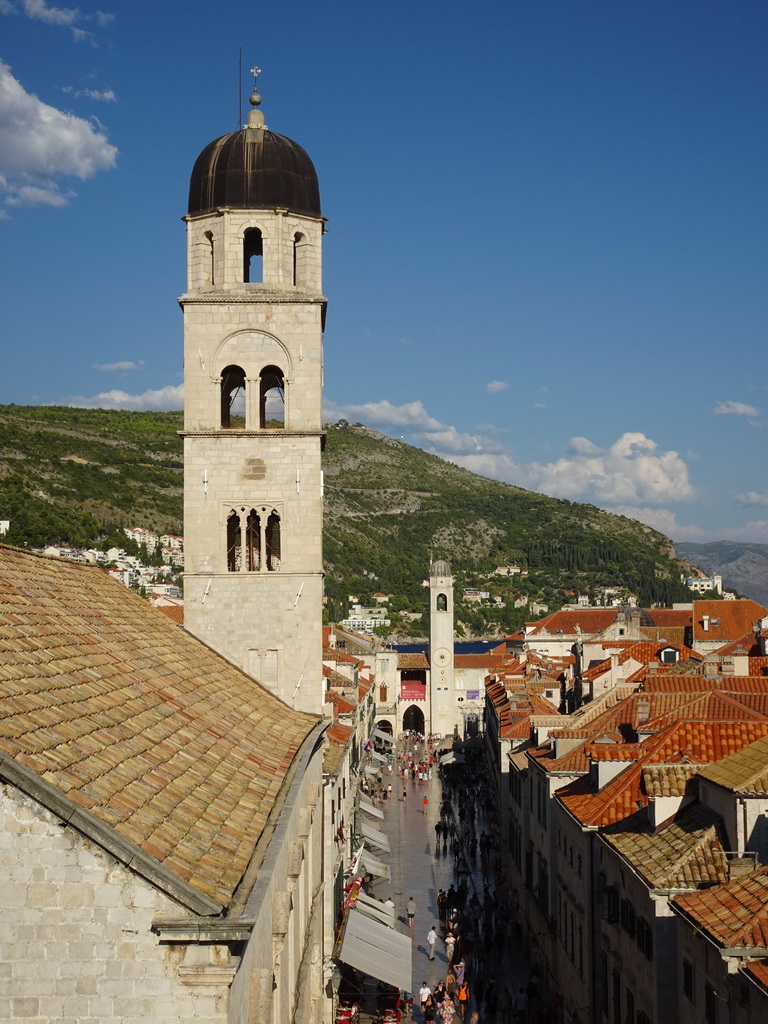 The Stradun street with the tower of the Franciscan Church and the Bell Tower, viewed from the top of the Pile Gate