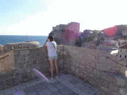 Miaomiao on top of the Kula Puncjela fortress, with a view on the Tvrdava Bokar fortress and Fort Lovrijenac