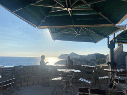 The terrace of the Caffe on the Wall restaurant at the top of the Kula sv. Petra fortress, with a view on Fort Lovrijenac and the Velika Petka Hill