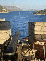 Cannon on top of the Kula sv. Petra fortress, with a view on the Lokrum island