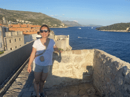 Miaomiao on top of the southern city walls, with a view on the southern side of the Old Town and the Lokrum island