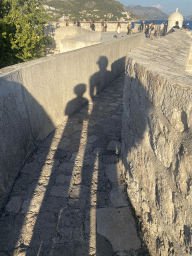 Tim`s and Max`s shadows at the top of the southern city walls and the Kula sv. Margarita fortress