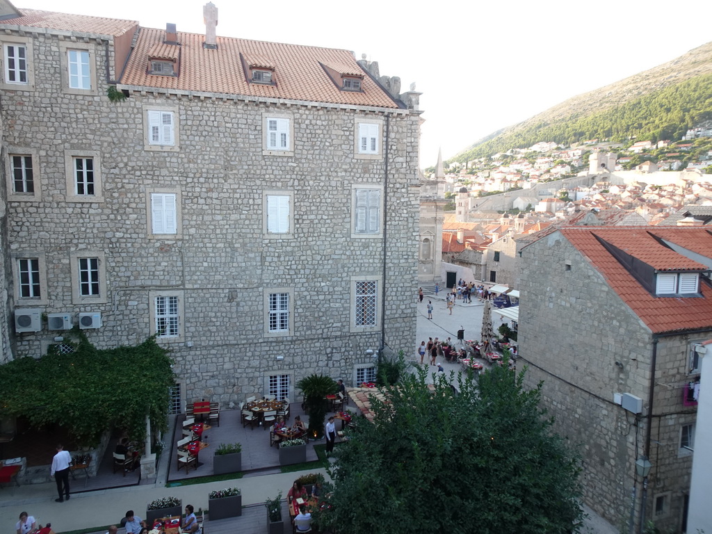 The Church of St. Margaret, restaurant terraces at the Ulica od Margarite street, the Church of St. Ignatius and the northwestern city walls with the Tvrdava Minceta fortress, viewed from the top of the Kula sv. Margarita fortress