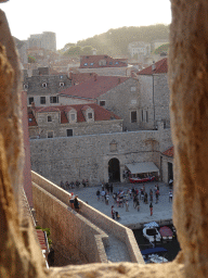 Window at the top of the Tvrdava Svetog Ivana fortress, with a view on the Old Port with the gate to the Poljana Marina Drica street and the Tvrdava Minceta fortress