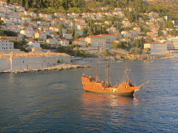 Old ship and the east side of the city with the Lazareti Creative Hub of Dubrovnik, the Plaa Banje beach and the Hotel Excelsior, viewed from the top of the Tvrdava Svetog Ivana fortress