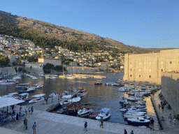 The Old Port, the Revelin Fortress, the Tvrdava Svetog Ivana fortress and the east side of the city with the Lazareti Creative Hub of Dubrovnik, the Plaa Banje beach and the Hotel Excelsior, viewed from the eastern city walls