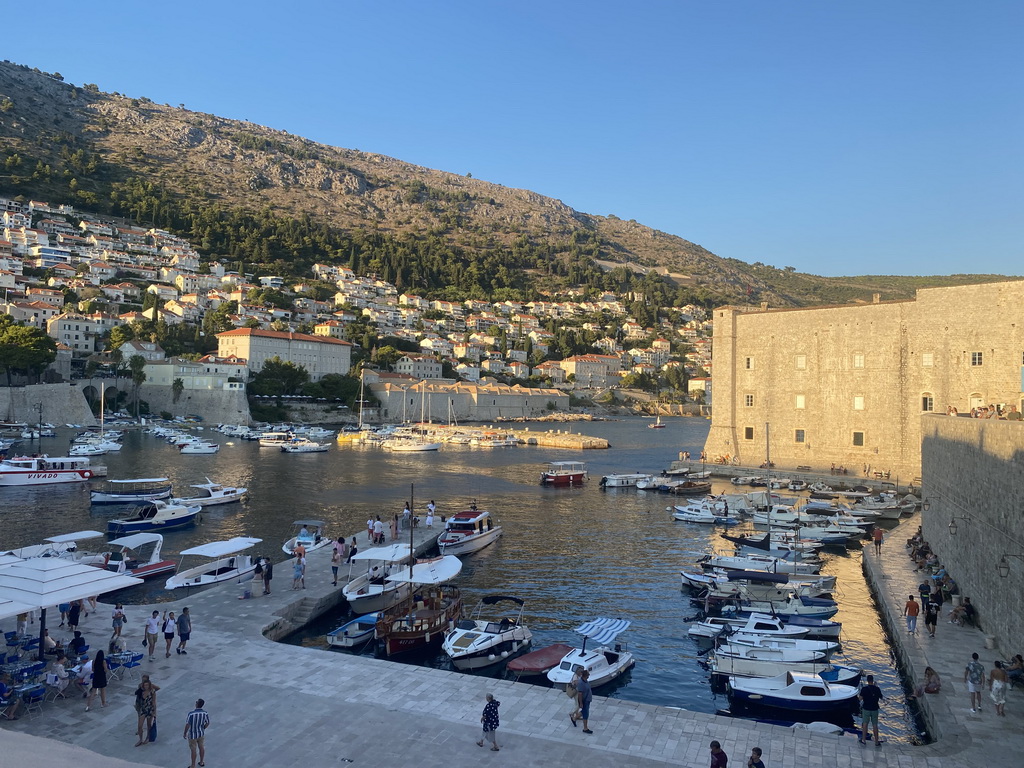 The Old Port, the Revelin Fortress, the Tvrdava Svetog Ivana fortress and the east side of the city with the Lazareti Creative Hub of Dubrovnik, the Plaa Banje beach and the Hotel Excelsior, viewed from the eastern city walls