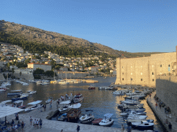 The Old Port, the Revelin Fortress, the Tvrdava Svetog Ivana fortress and the east side of the city with the Lazareti Creative Hub of Dubrovnik, the Plaa Banje beach and the Hotel Excelsior, viewed from the eastern city walls