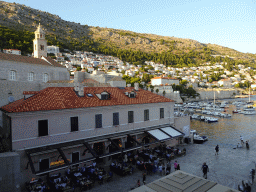 The Old Port, the front of the Poklisar Restaurant at the Od Ribarnice street, the Dominican Monastery, the Revelin Fortress and the east side of the city with the Lazareti Creative Hub of Dubrovnik, the Plaa Banje beach and the Hotel Excelsior, viewed from the eastern city walls