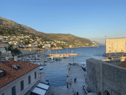 The Old Port, the Tvrdava Svetog Ivana fortress and the east side of the city with the Lazareti Creative Hub of Dubrovnik, the Plaa Banje beach and the Hotel Excelsior, viewed from the top of the eastern city walls