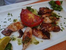 Squid at the terrace of the Konoba Saint Blaise restaurant at the Zeljarica Ulica street