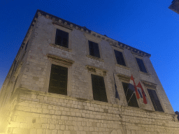 Facade of a building at the Gunduliceva Poljana market square, by night