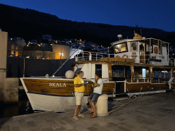 Ferry to the Lokrum island at the Old Port and the Kula sv. Luke fortress, by night