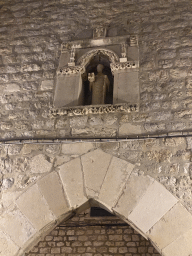 Statue above the gate from the Old Port to the Stradun street, by night