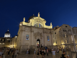 Front of St. Blaise`s Church and Orlando`s Column, under renovation, at the Stradun street and the Dubrovnik Cathedral, by night