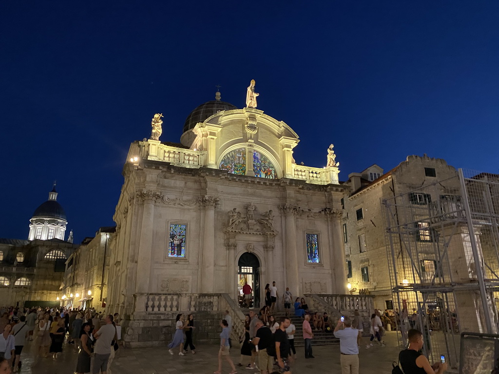 Front of St. Blaise`s Church and Orlando`s Column, under renovation, at the Stradun street and the Dubrovnik Cathedral, by night