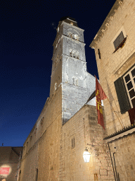 The facade and tower of the Franciscan Church, viewed from the Stradun street, by night
