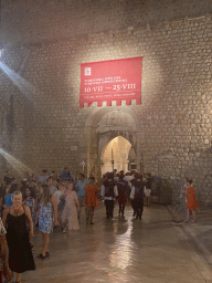 Guards walking from the Stradun street to the Pile Gate, by night