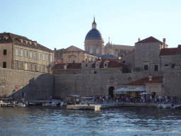 The Old Port with the eastern city walls and the Dubrovnik Cathedral, viewed from the ferry from the Lokrum island