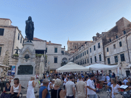 The Gunduliceva Poljana market square with market stalls, the statue of Ivan Gundulic and the Church of St. Ignatius