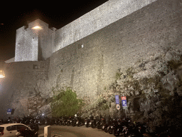 The northern city walls with the Kula sv. Vid fortress, viewed from the tour bus from Perast on the Ulica Maria Perica street, by night