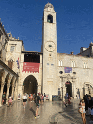 The front of the Sponza Palace, the Bell Tower and the Small Onofrio Fountain at the west side of the Stradun street