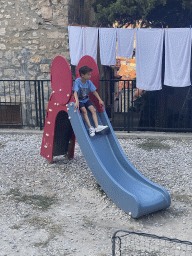 Max on a slide at the Old City Playground at the Ulica od Katela street