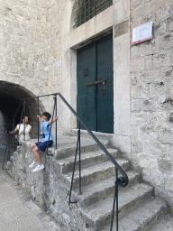 Miaomiao and Max in front of the entrance to the Ethnografic Museum Rupe at the Ulica od orte street