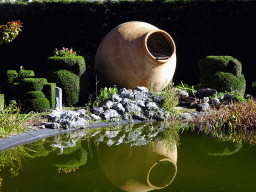 Pond, vessel and topiaries at the northeast side of the Topiary Park