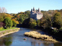 Canoe in the Ourthe river and the Durbuy Castle, viewed from the pedestrian bridge at the west side of town