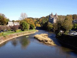 Canoes in the Ourthe river and the Durbuy Castle, viewed from the pedestrian bridge at the west side of town