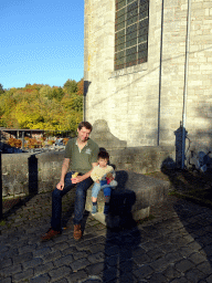 Tim and Max with an ice cream in front of the Église Saint-Nicolas church at the Rue du Comte Théodule d`Ursel street