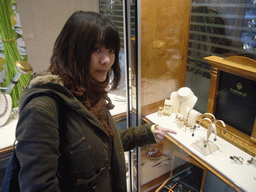 Miaomiao and Fabergé jewelry in a shop window