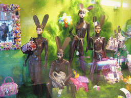 Easter mannequins and purses in a shop window