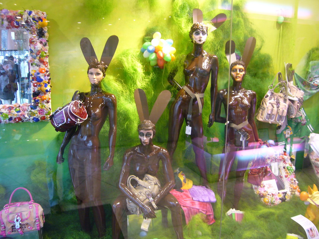 Easter mannequins and purses in a shop window