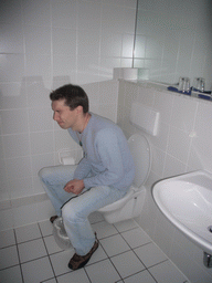 Tim on our toilet in the Hotel an der Kö