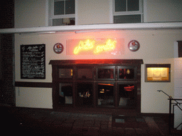 The front of the Miles Smiles pub, by night