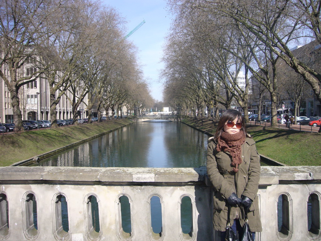 Miaomiao on a bridge in the Königsallee street