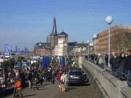 The Rhine shore, with the Pegeluhr clock, the Old Castle Tower and the Lambertuskirche church