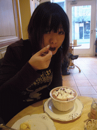 Miaomiao having hot chocolate in the chocolate shop `Gut & Gerne`