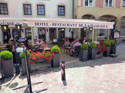 Miaomiao at the De La Basilique restaurant at the northeast side of the Place du Marché square