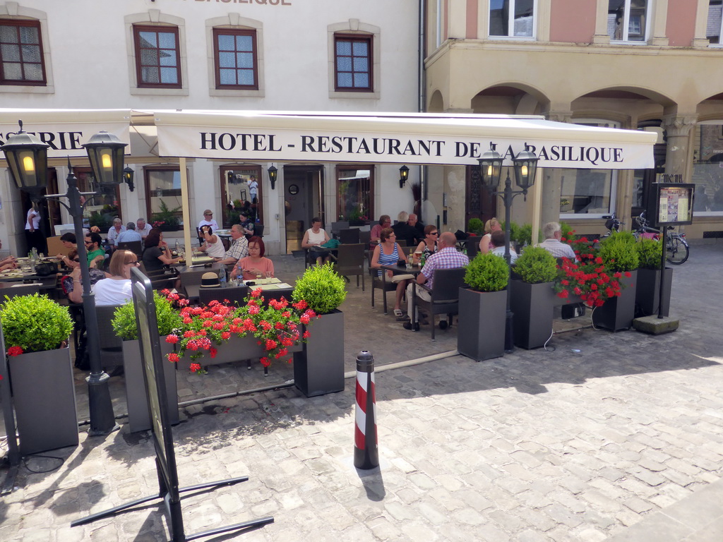 Miaomiao at the De La Basilique restaurant at the northeast side of the Place du Marché square